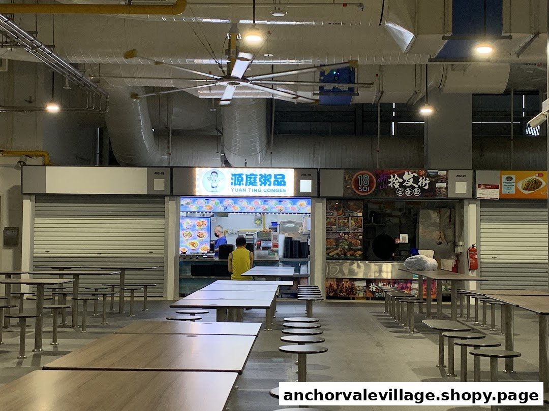 Yuan Ting Congee stall in a food court, featuring its counter and dining area.