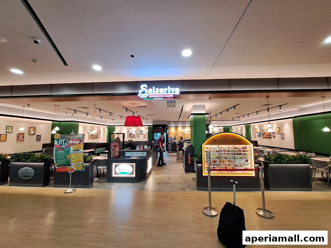 The entrance of Saizeriya restaurant at Aperia Mall, featuring its signage and a grand menu display.