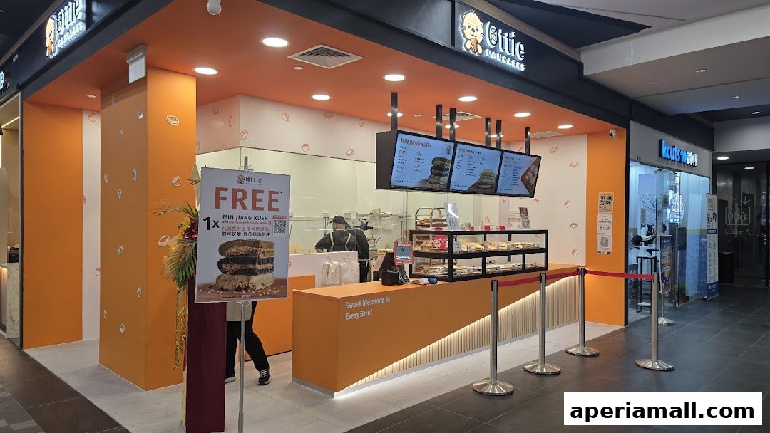 The Ottie Pancakes shop front with bright orange accents and a display counter.