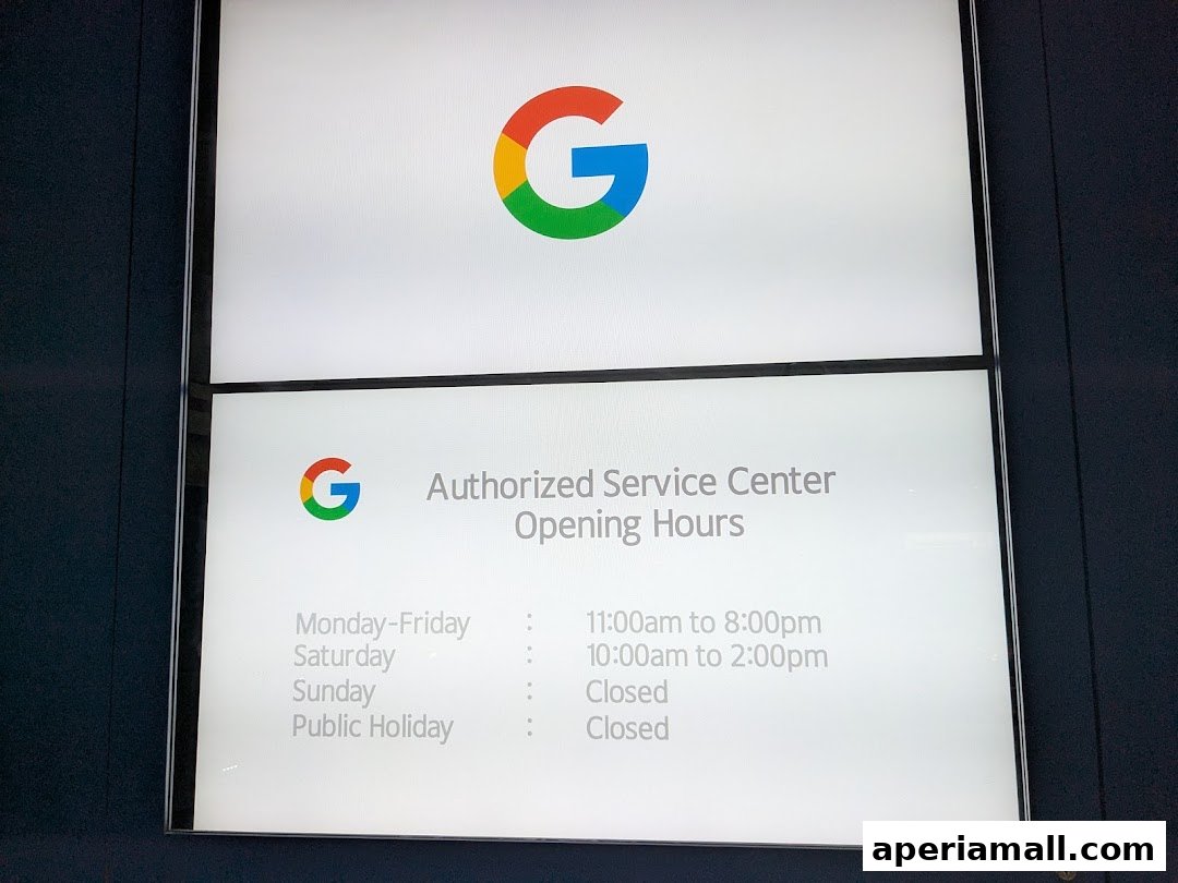 Sign displaying Google Authorized Service Center opening hours.