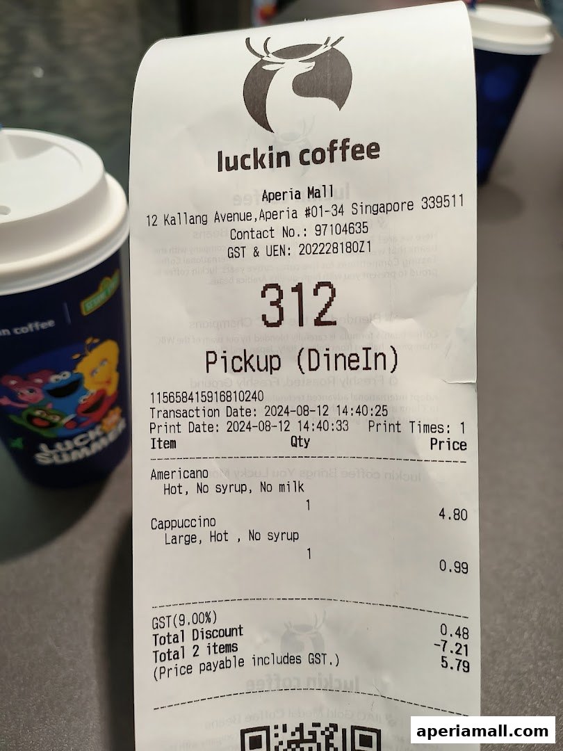 A receipt from Luckin Coffee showing two coffee orders and transaction details.