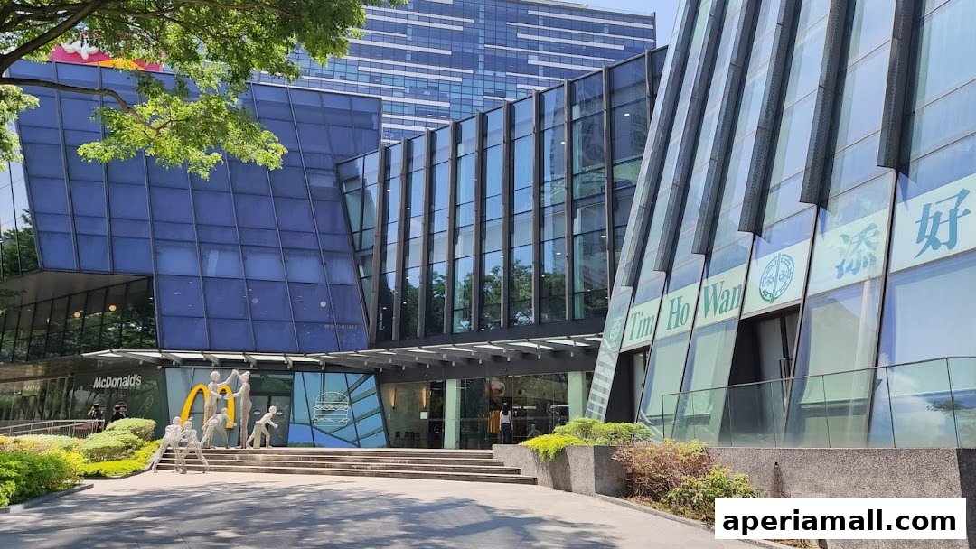 The modern Aperia building features a McDonald's and Tim Ho Wan on the ground floor.