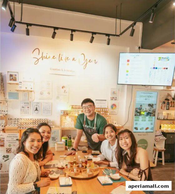 A group of people smiling around a table with crafting supplies at WellnessGemstory.