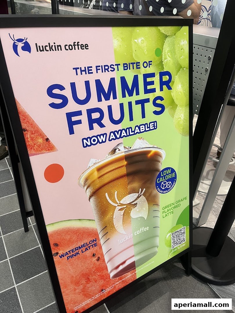 A sign advertising Luckin Coffee's new summer fruit flavored lattes.