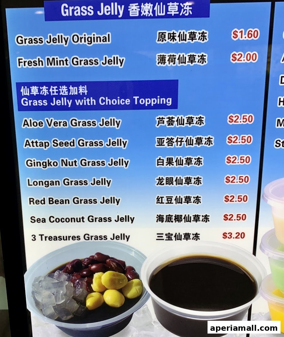 A menu board displays various grass jelly desserts with prices and ingredients.