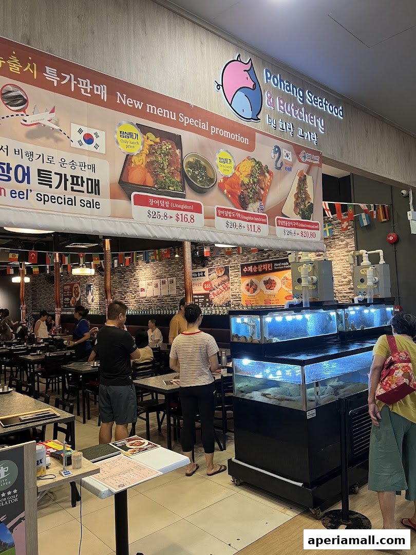 Pohang Seafood & Butchery shop with a banner advertising new menu specials and live seafood tanks.
