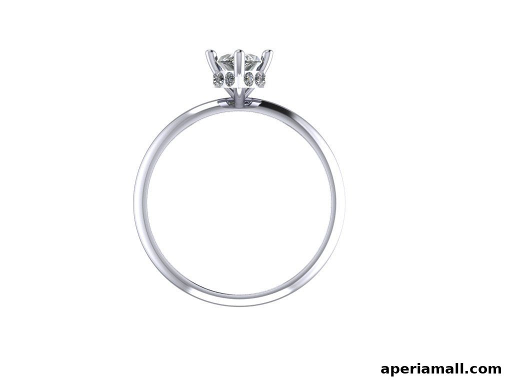 A close-up studio shot of a delicate silver ring with a central diamond and smaller diamonds.