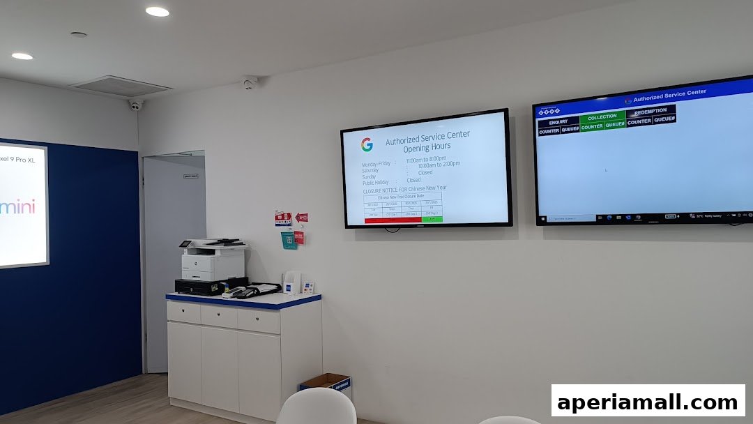 Interior of an authorized service center with screens displaying operating hours and queue status.