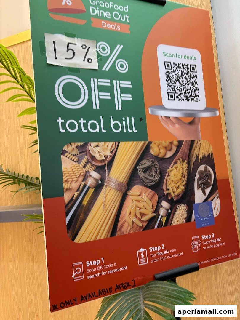 A sign advertising 15% off total bill at Little Ribbons Pasta Co. with GrabFood Dine Out.