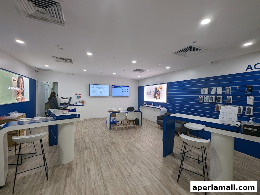 Interior of a modern tech store showcasing Google Pixel phones and accessories.