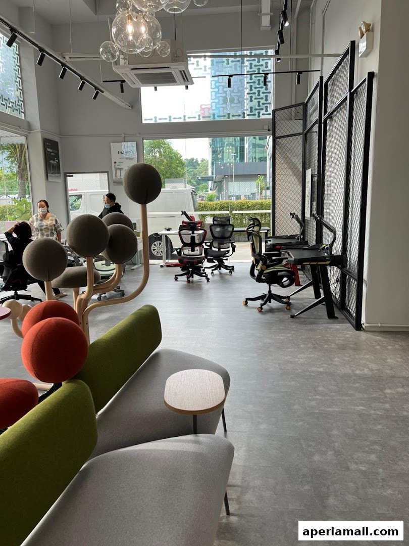 Interior of a modern showroom displaying ergonomic chairs and stylish seating.