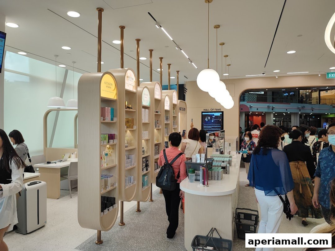 Interior of a modern beauty store with shelves displaying products and customers browsing.