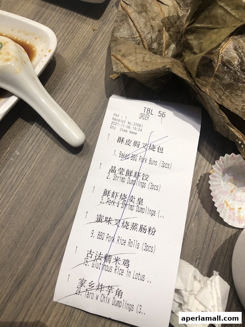 A receipt from Tim Ho Wan lists various dim sum dishes with quantities and descriptions.