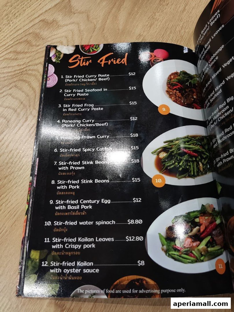 A menu page from Im-Em Thai Kitchen featuring a 'Stir Fried' section with various dishes and prices.