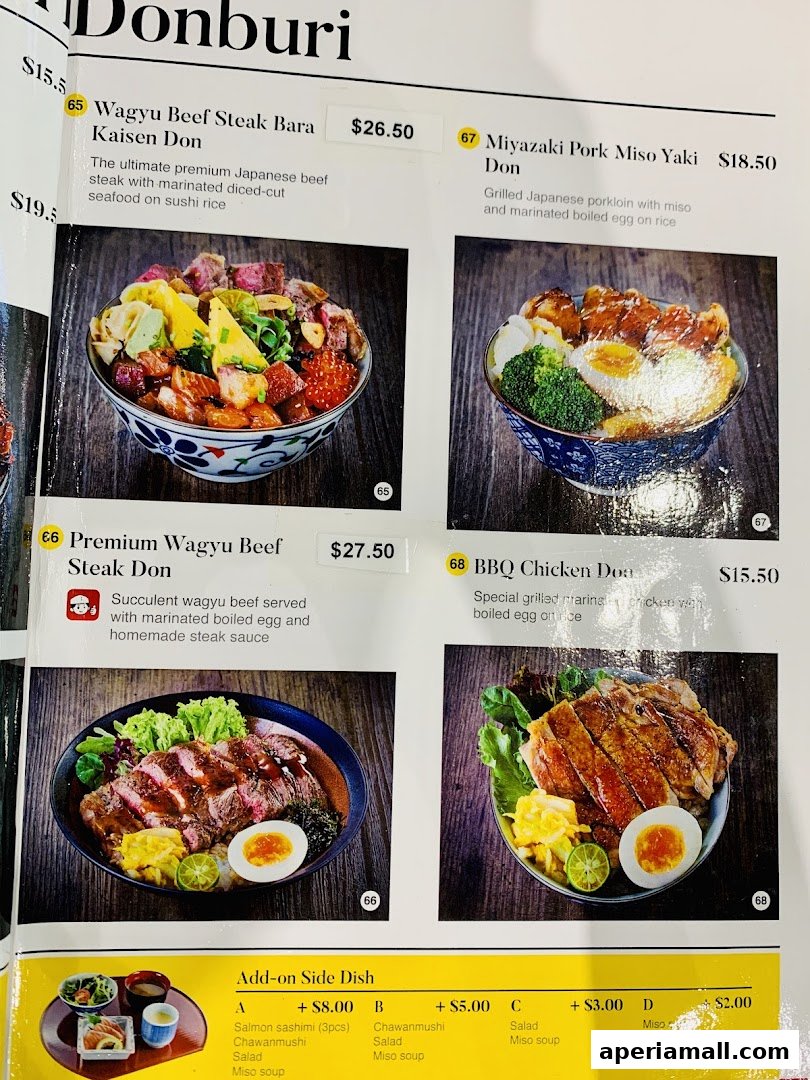 A menu featuring various donburi dishes with descriptions and prices, plus add-on side dishes.