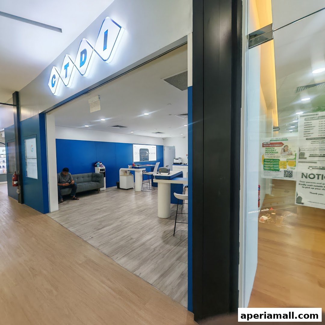 The entrance to CTDI Singapore, a modern electronics service center with a blue and white interior.