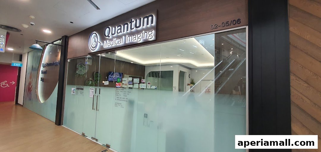 The exterior of Quantum Medical Imaging, a modern clinic with glass doors and signage.