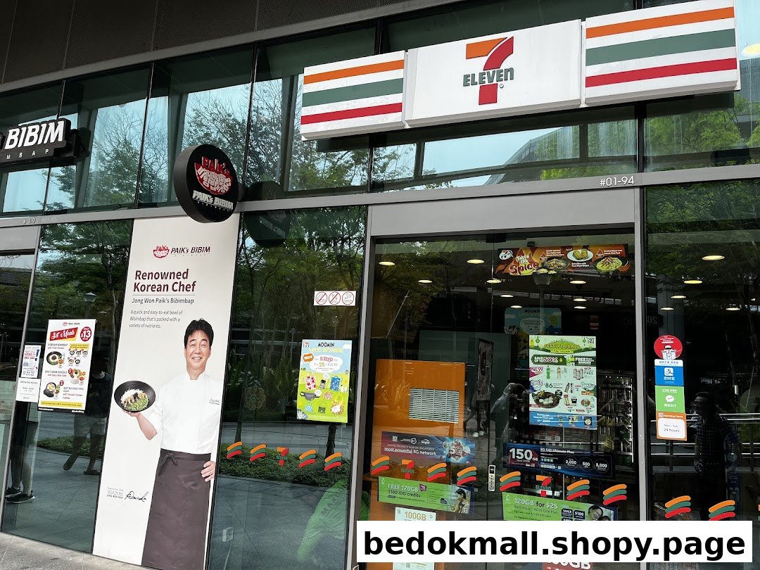Exterior view of a 7-Eleven store with promotional posters on glass doors.