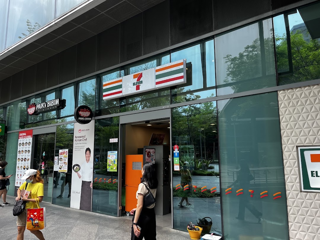 Exterior view of a 7-Eleven shop with its entrance and signage.