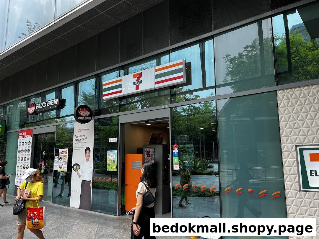 Exterior view of a 7-Eleven shop with its entrance and signage.