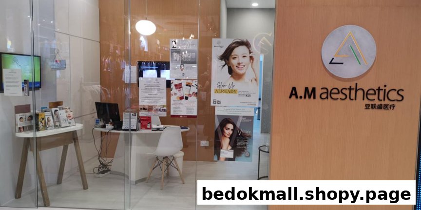 Glass shop front of A.M Aesthetics with reception desk and posters inside.