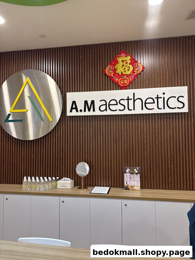 Interior view of A.M Aesthetics reception area with logo and counter.