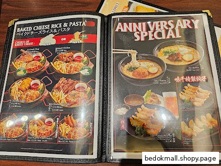 Open menu displaying various food items and specials.