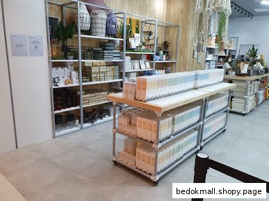 Interior view of a retail shop displaying various home goods and boxed products.