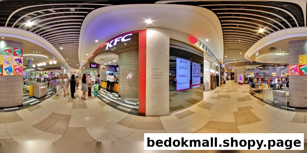 Interior view of a shopping mall with various shops, including KFC and Bank of China.