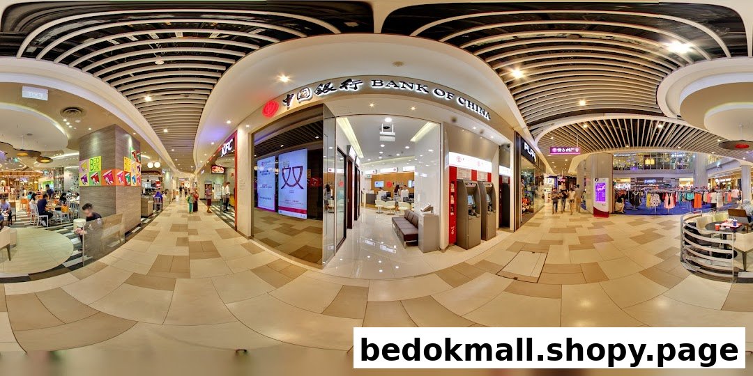 Entrance of Bank of China in a shopping mall, with ATMs and interior visible.