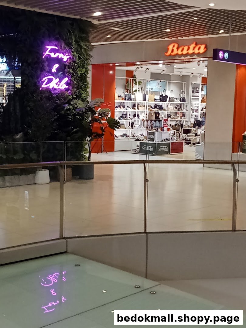Bata shoe store entrance with visible interior displays in a mall.