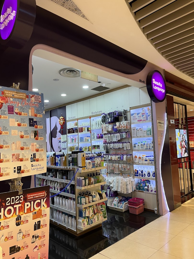 Entrance of Beauty Language shop with skincare products and promotional posters.