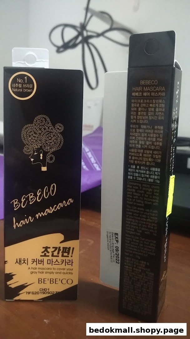 Two boxes of Bebeco hair mascara product packaging on a surface.