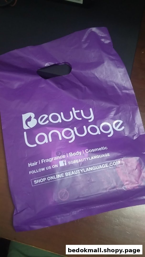 A purple shopping bag with "Beauty Language" logo and text.