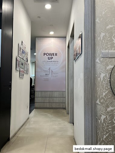 Interior hallway with a 'POWER UP' poster and doors.