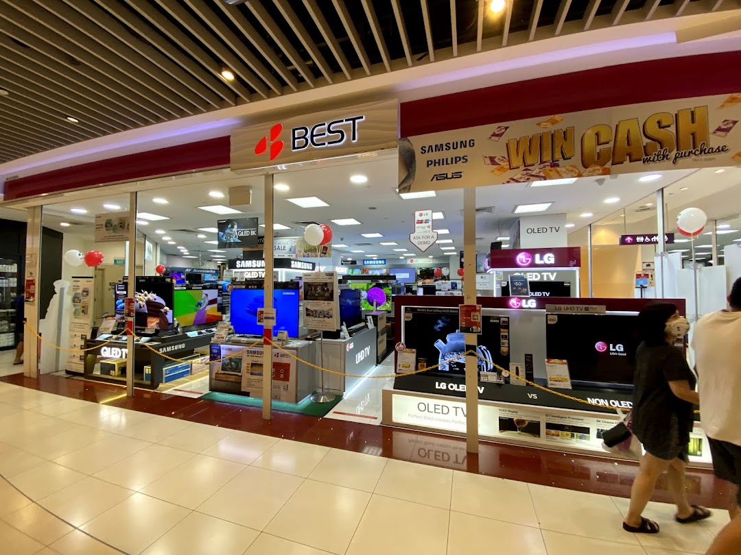 Exterior view of an electronics store with TVs displayed and a 'Win Cash' sign.