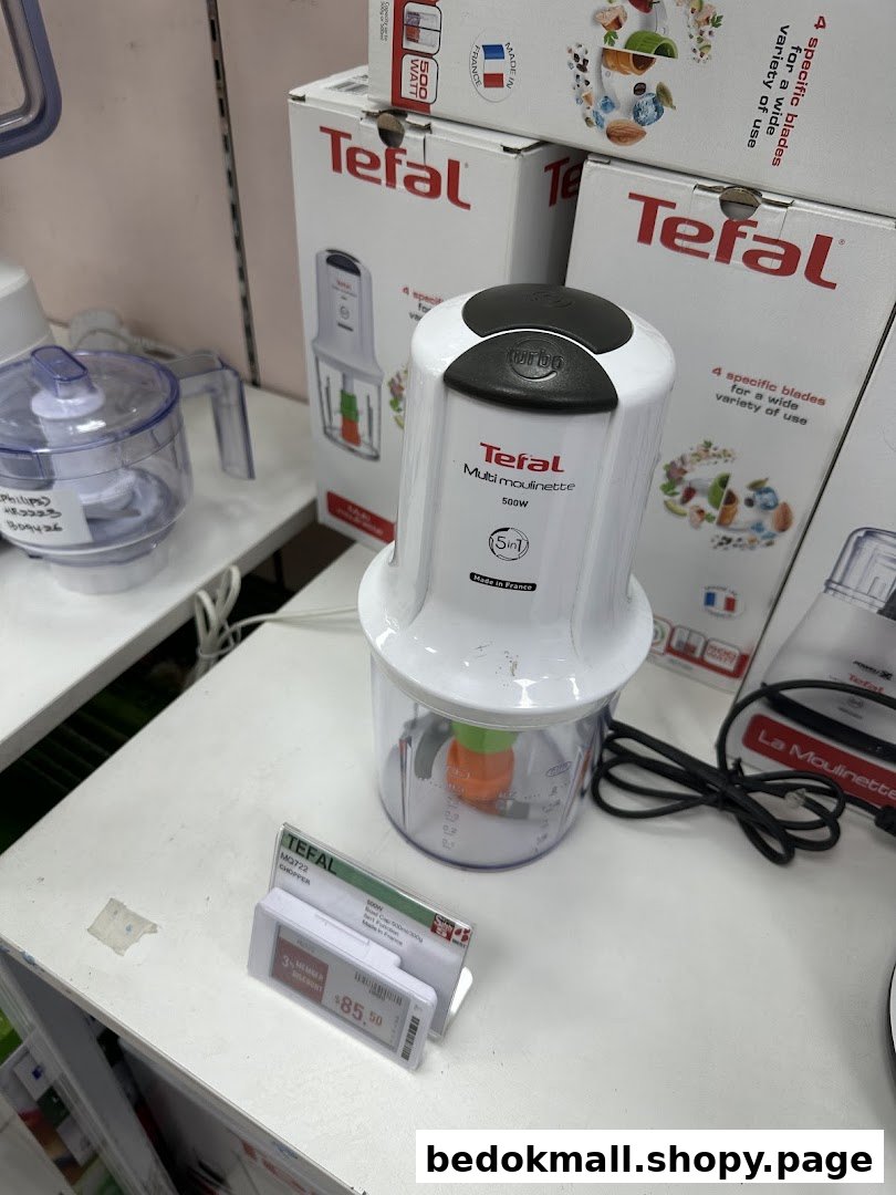 Tefal Multi Moulinette and other kitchen appliances displayed on a shelf.