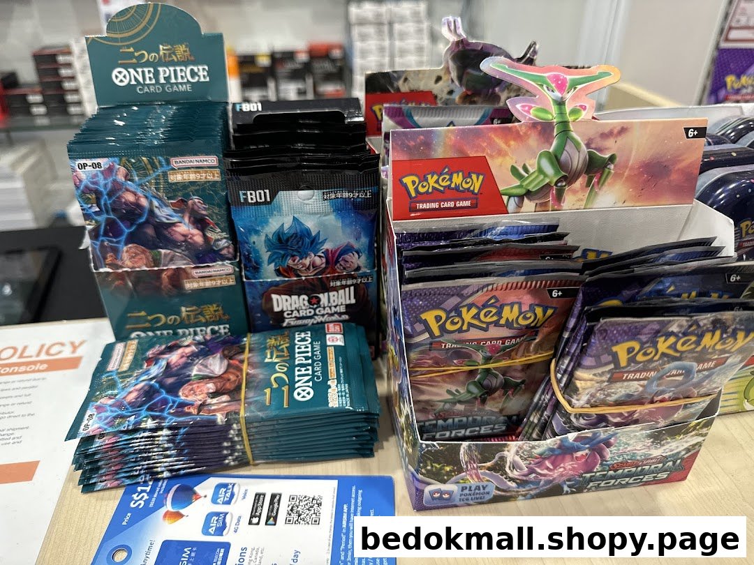 Display of One Piece, Dragon Ball, and Pokemon trading card game packs.