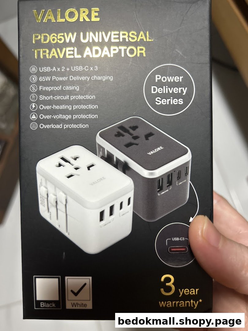 Product packaging for a Valore universal travel adaptor.