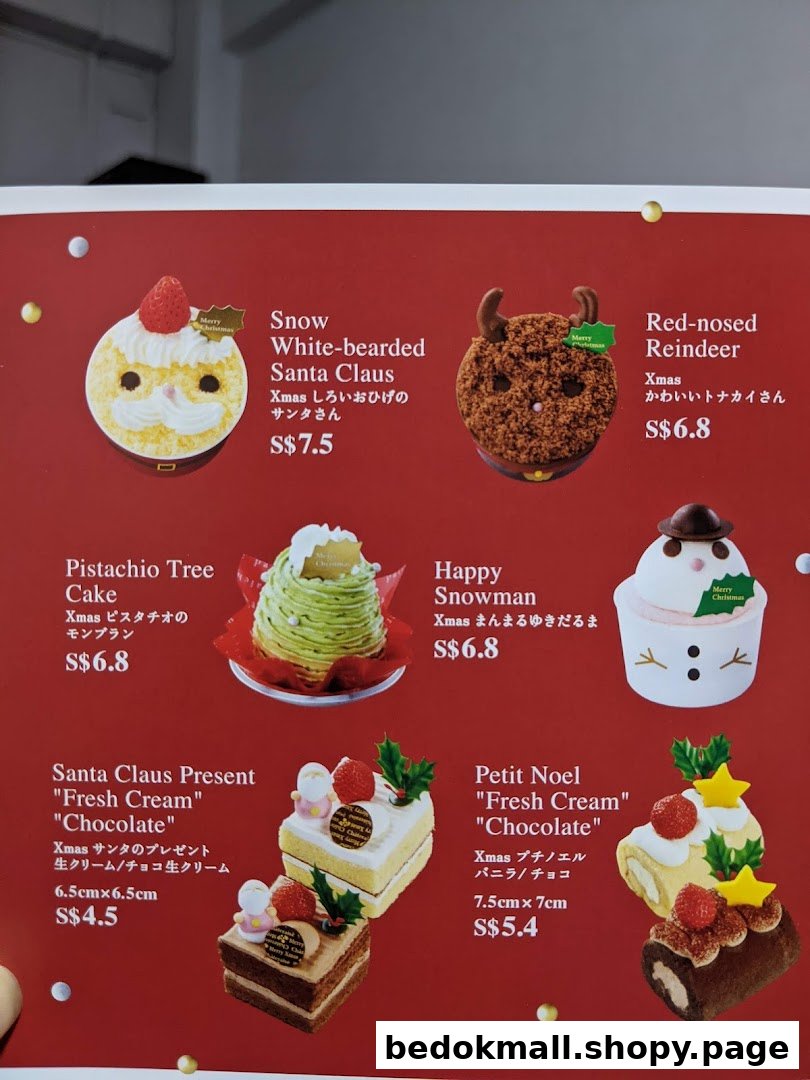 Close-up of a menu displaying various Christmas-themed cakes and their prices.