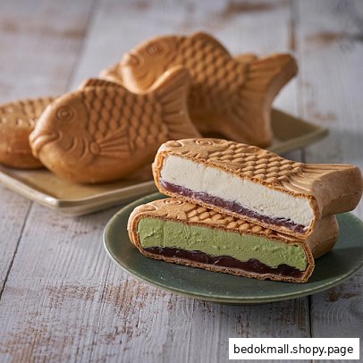 Fish-shaped ice cream sandwiches with various fillings on plates.