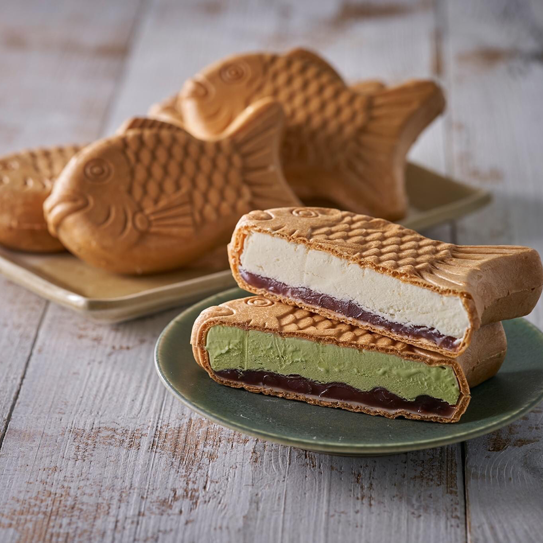 Taiyaki ice cream sandwiches with vanilla and matcha fillings.