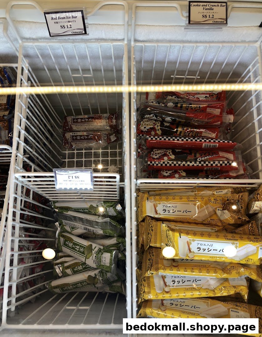 Freezer display case filled with various packaged ice cream bars.