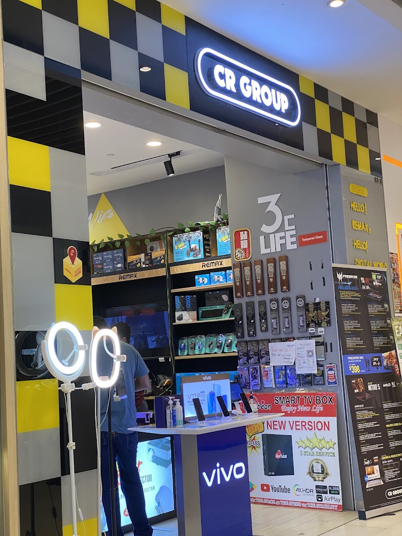 Front view of an electronics shop named CR Group.