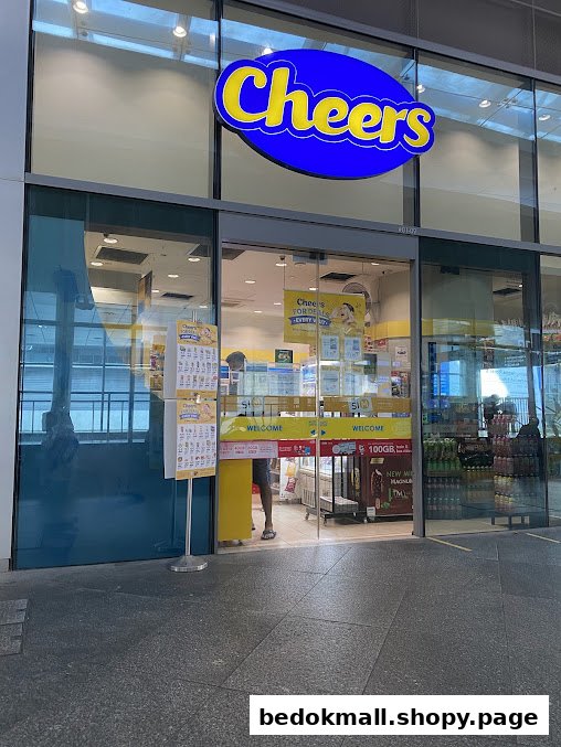 Exterior view of a Cheers convenience store with its entrance and signage.