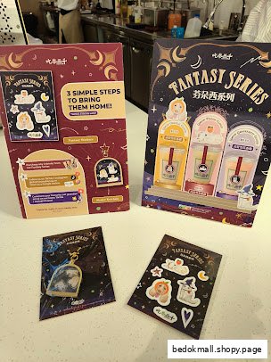 Promotional displays for a 'Fantasy Series' with drinks, stickers, and a keychain.