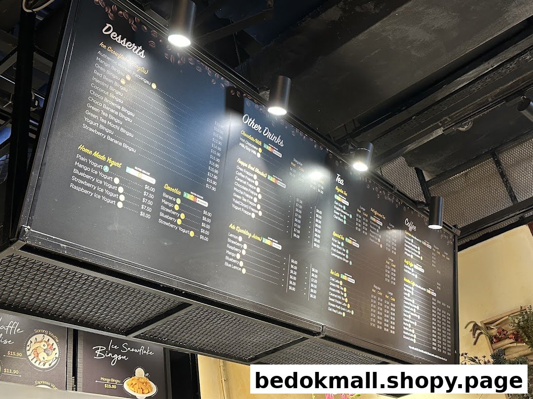 Large menu board displaying desserts, drinks, and coffee options with prices.