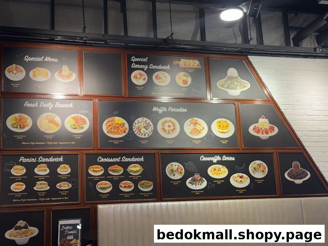 Wall-mounted menu boards displaying various food items and prices.