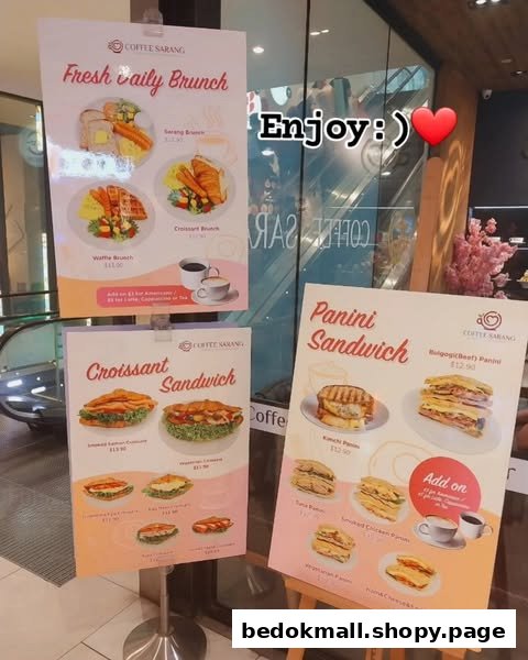 Three display boards show various food menus and prices for Coffee Sarang.