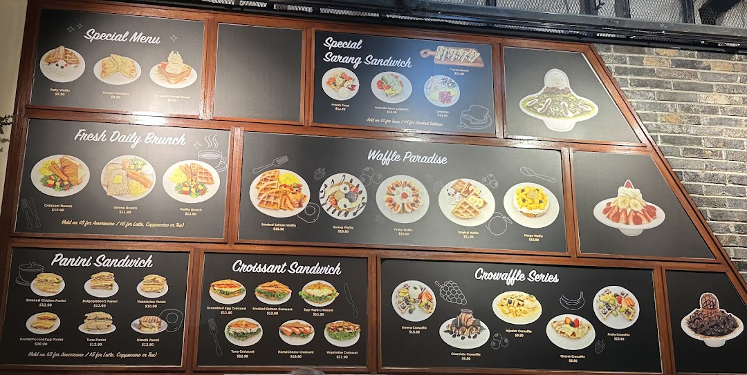 A large menu board displaying various food items and their prices.